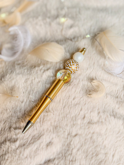 Stylo doré BloomLov décoré de perles blanches, à chevrons et pailletées